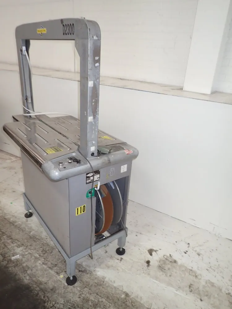 Dynaric Inc. Strapping Machine