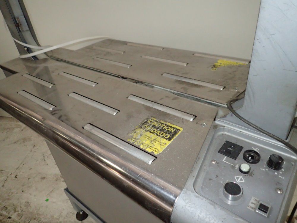 Dynaric Inc. Strapping Machine