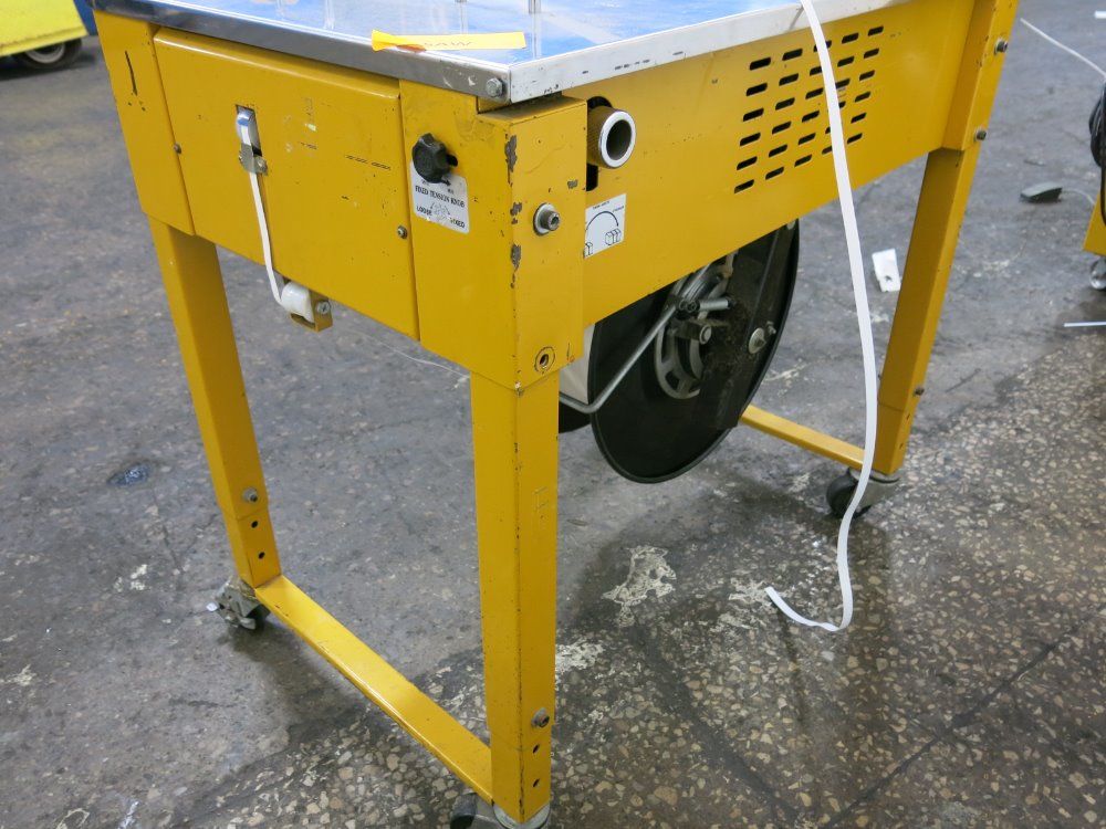 Polychem Strapping Machine