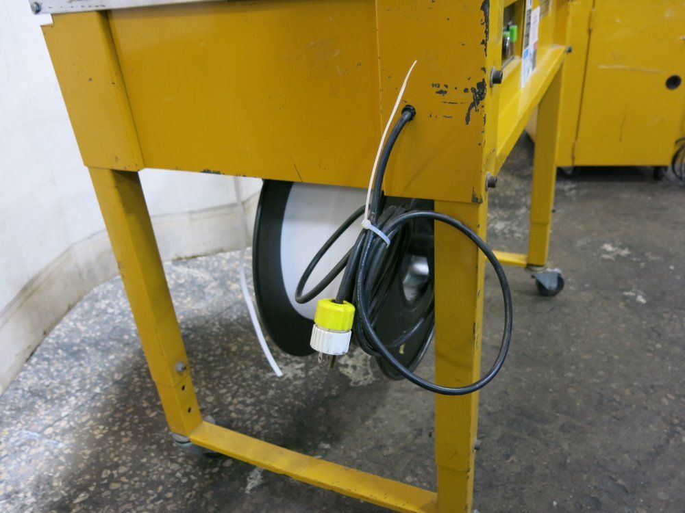 Polychem Strapping Machine