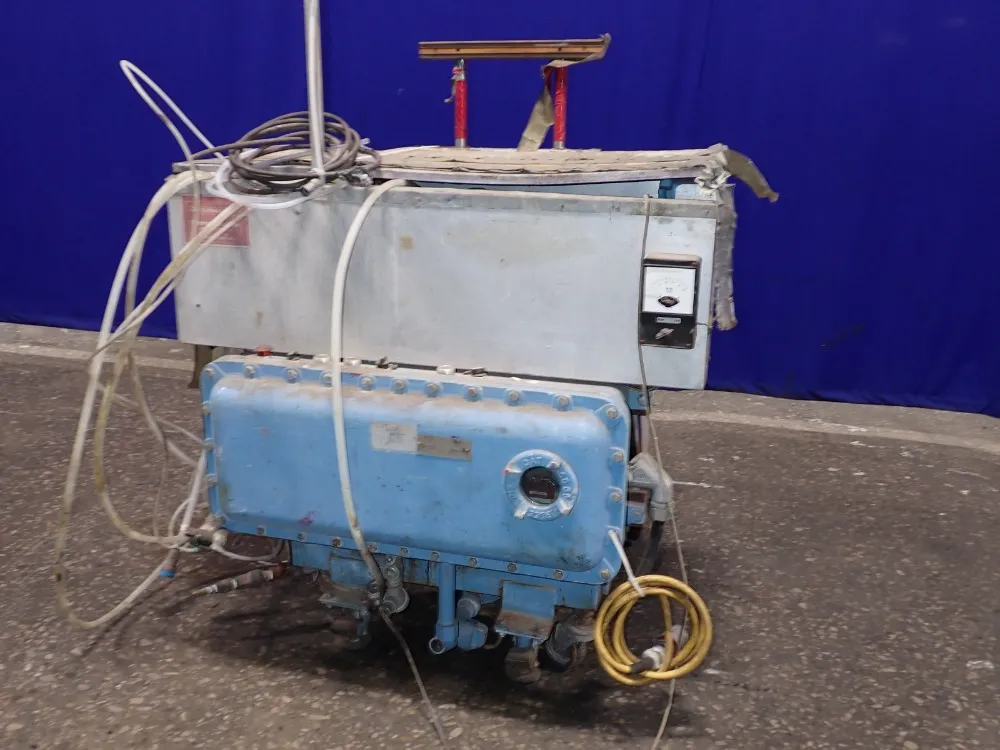 Spraymation Adhesive Dispensing System