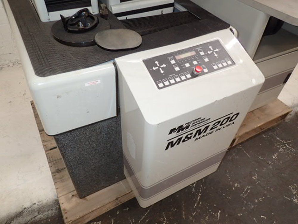 M & M Precision Systems Corp. Measuring Mnachine