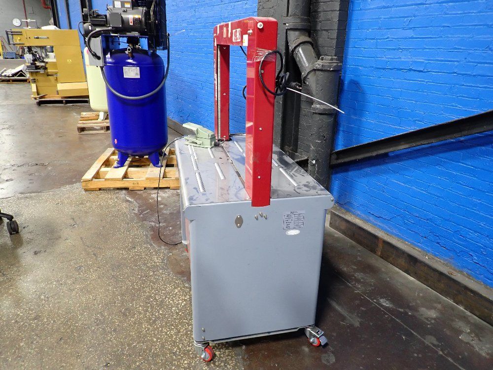 Pac 2020 Pac Sm65 Automatic Strapping Machine