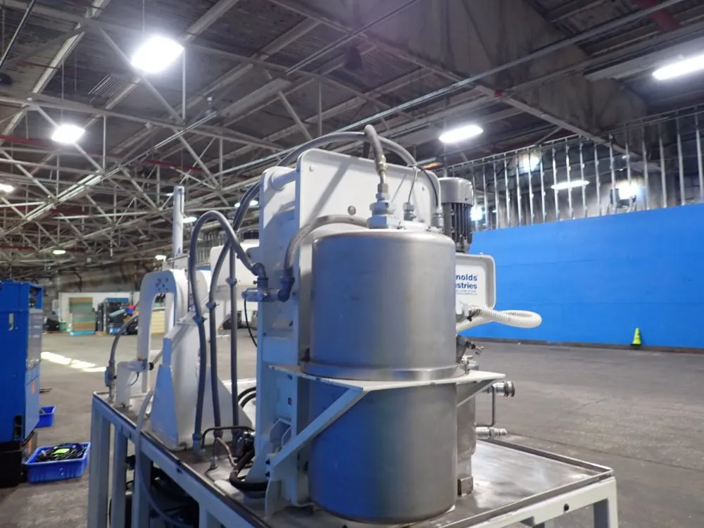 Reynolds Industries Mixer/press System