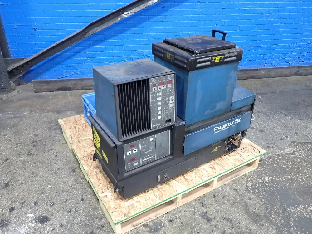 ADHESIVE DISPENSING SYSTEM