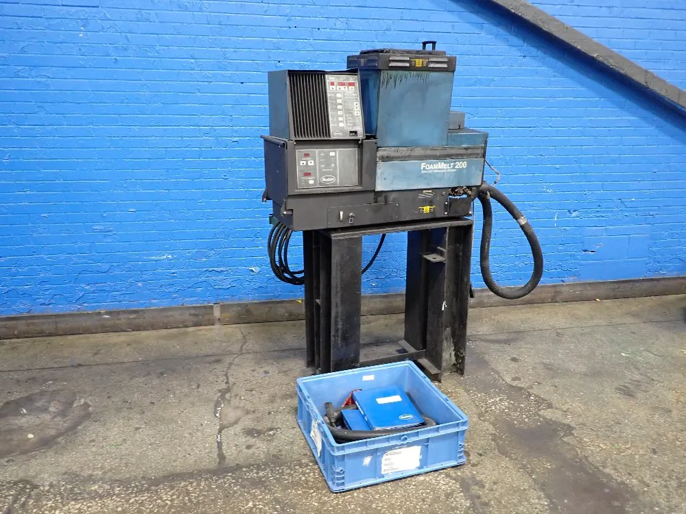 ADHESIVE DISPENSING SYSTEM