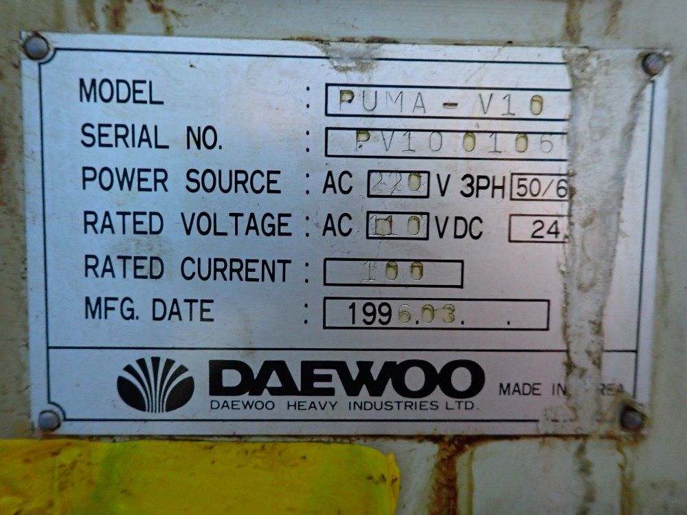 Daewoo Cnc Lathe W Conveyor - Puma V10