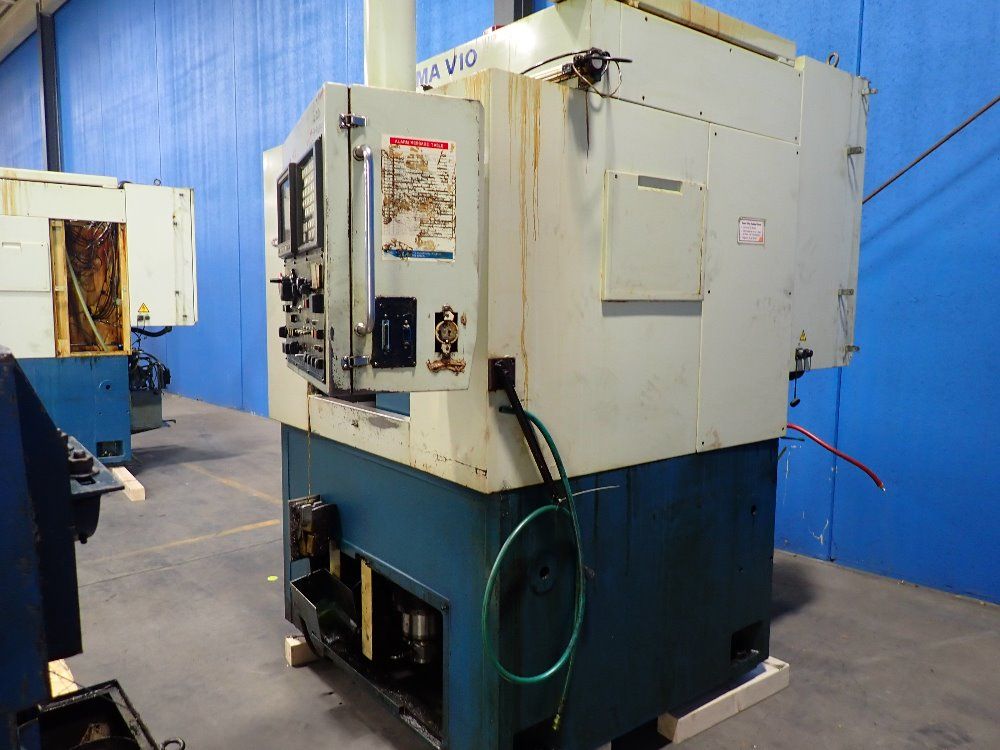 Daewoo Cnc Lathe W Conveyor - Puma V10