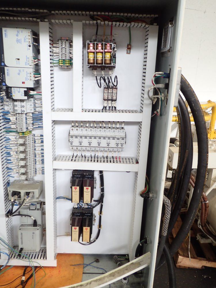 Universal Multishot Systems Injection Molder