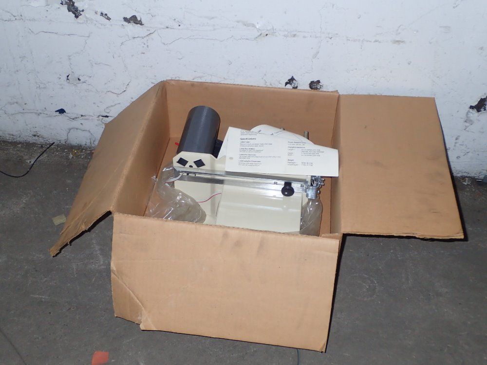 Grip A Tab Electric Label Dispenser