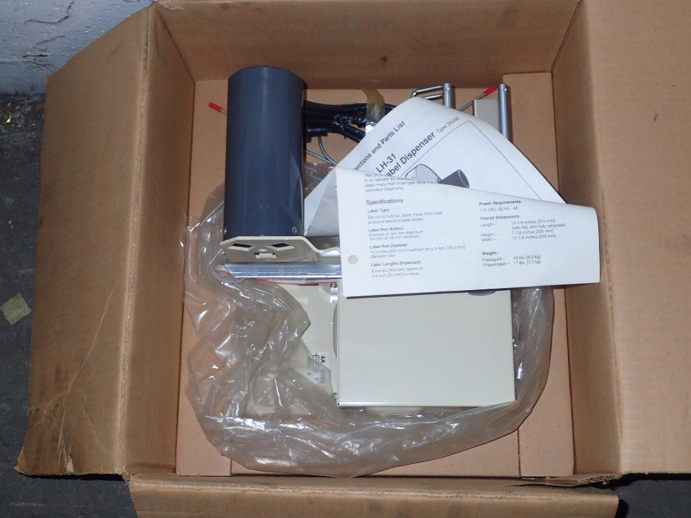 Grip A Tab Electric Label Dispenser