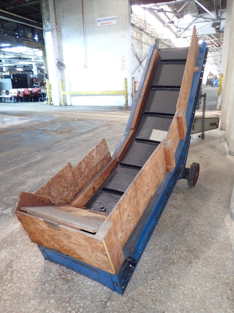 Plastic Machinery Inc. Chip Conveyor