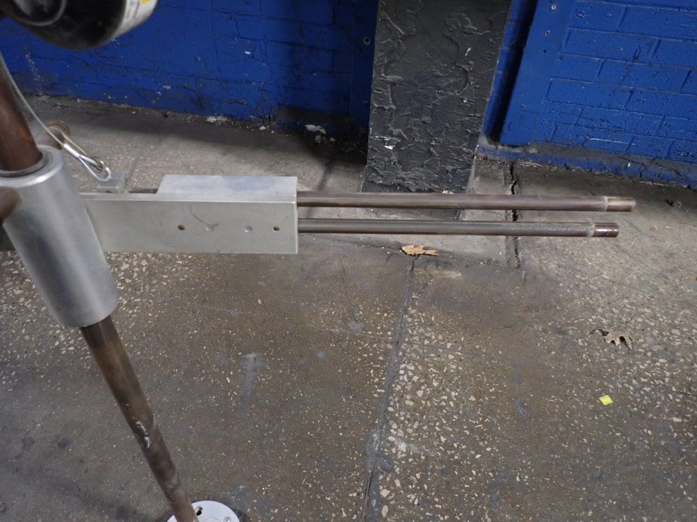 Torque Reaction Positioning Arm