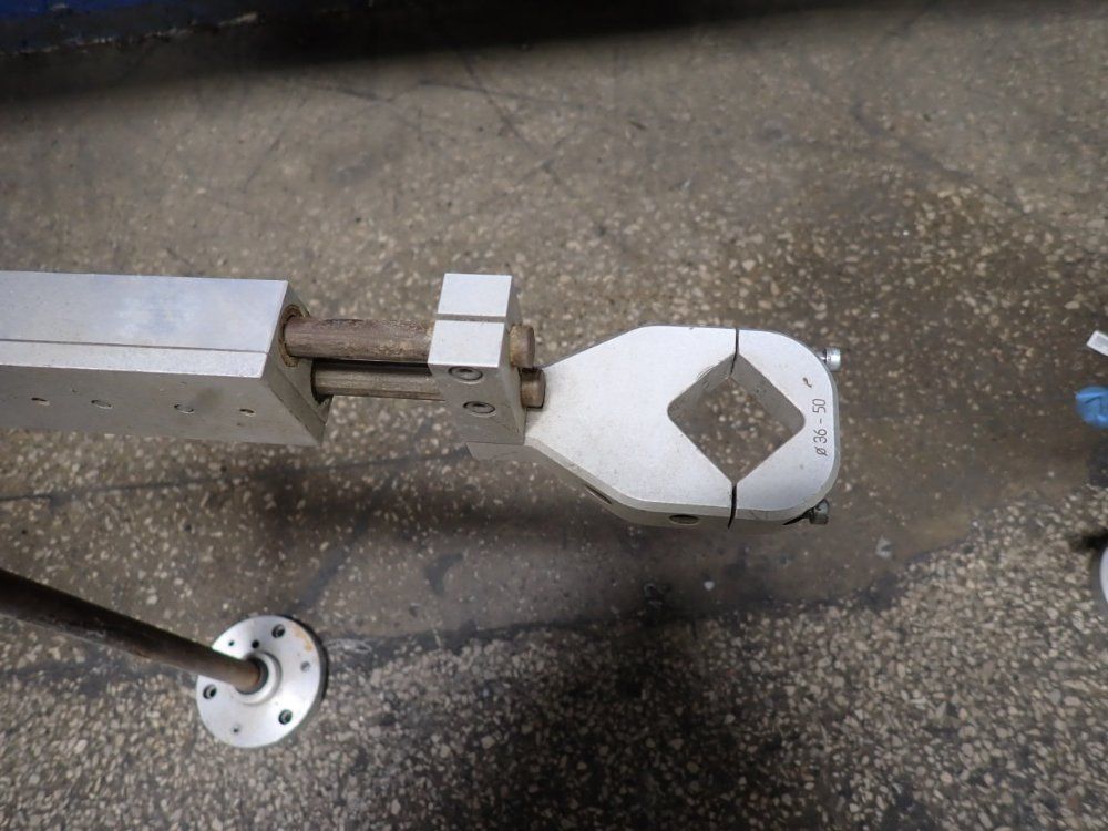 Torque Reaction Positioning Arm