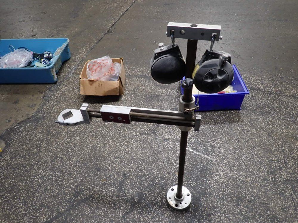 Torque Reaction Positioning Arm