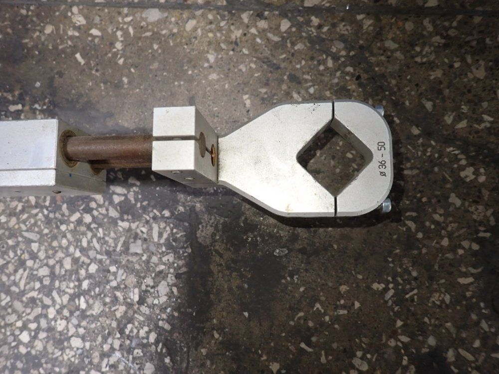 Torque Reaction Positioning Arm