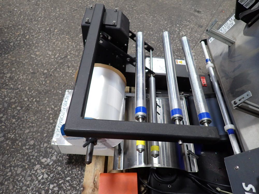 Sharp Packaging Systems Sharp Packaging Systems Max Plus Automatic Bagger