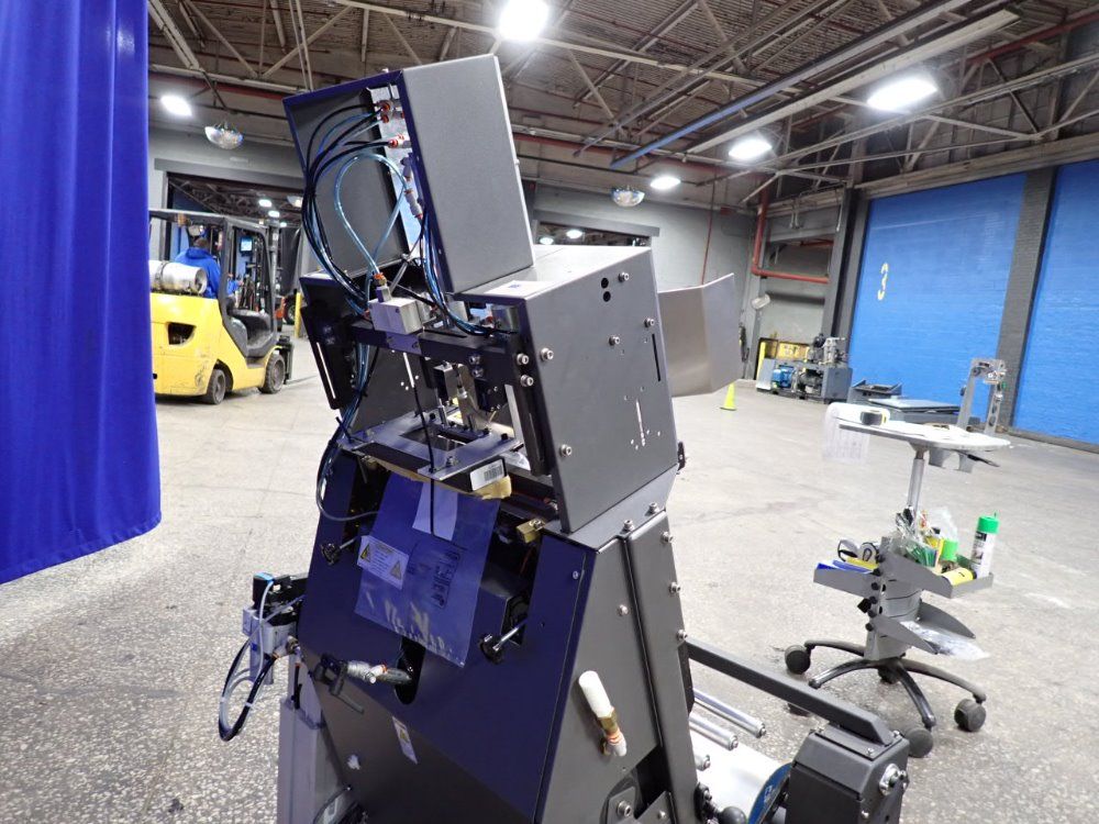 Sharp Packaging Systems Sharp Packaging Systems Max Plus Automatic Bagger
