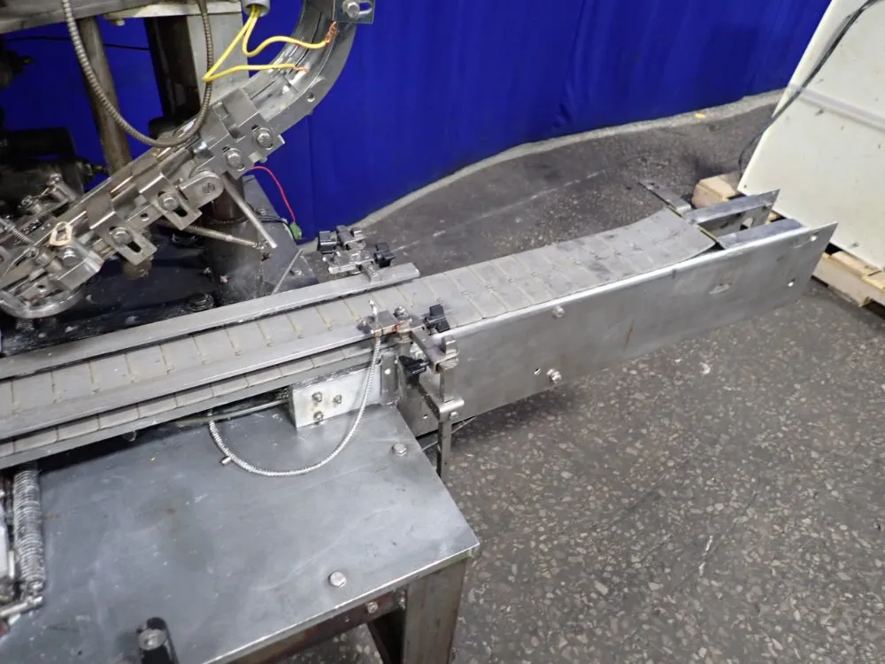 Resina Automatic Machinery 4 1/2" X 98" Capper - Sn30