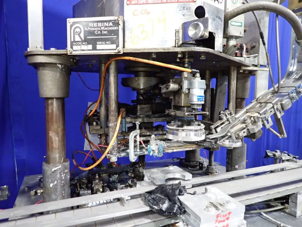 Resina Automatic Machinery 4 1/2" X 98" Capper - Sn30