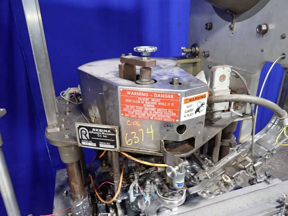 Resina Automatic Machinery 4 1/2" X 98" Capper - Sn30