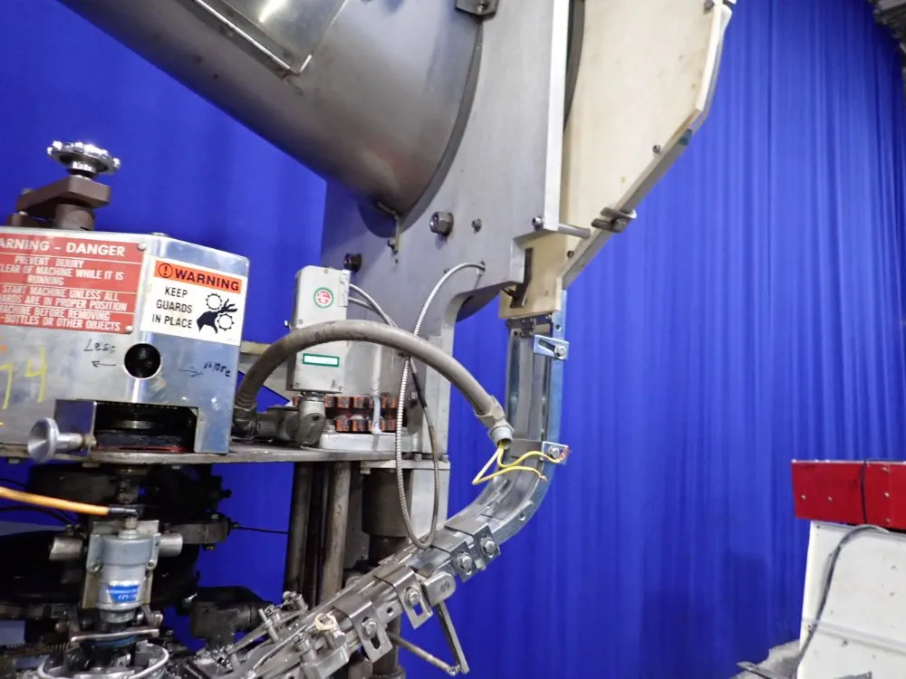 Resina Automatic Machinery 4 1/2" X 98" Capper - Sn30