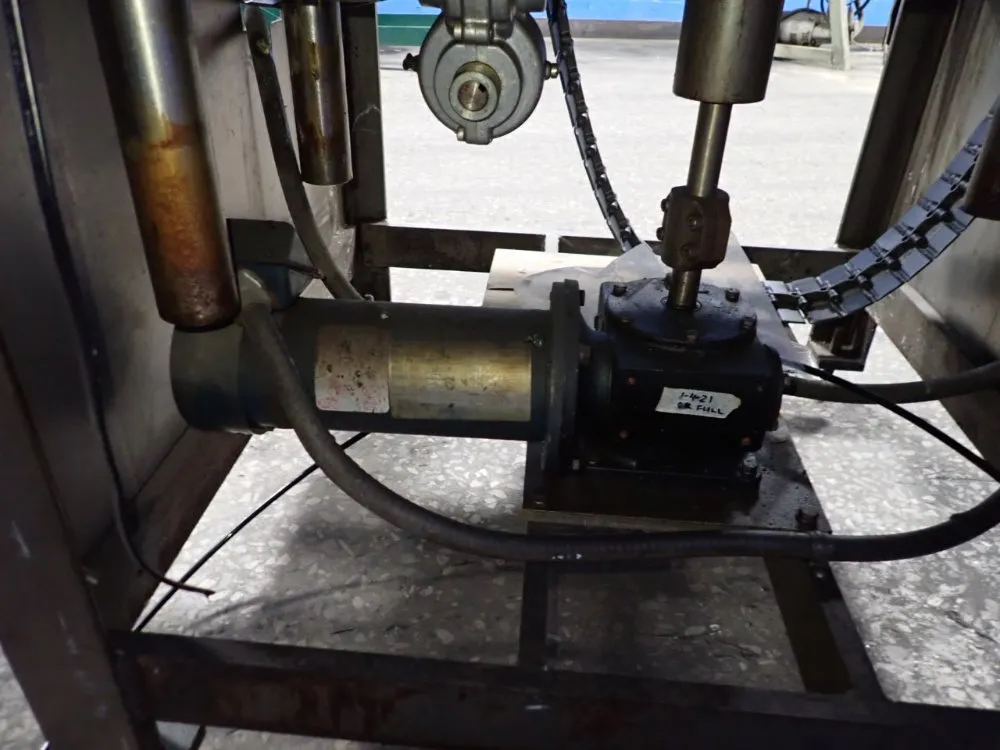 Resina Automatic Machinery 4 1/2" X 98" Capper - Sn30