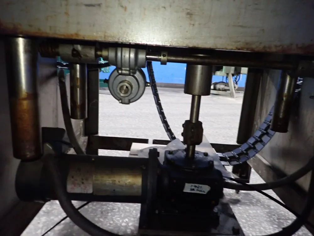 Resina Automatic Machinery 4 1/2" X 98" Capper - Sn30