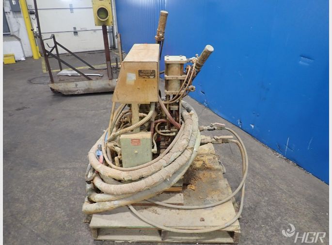 Gusmer Plural  Component Spray Machine