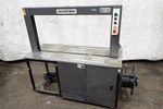 Polychem Strapping Machine