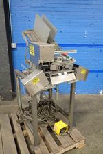 Apaiaction Packaging Automation Apaiaction Packaging Automation St2 Tag Clipper