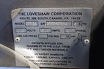 The Love Shaw Corporation Case Sealer