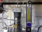 Neutronics Gas Analyzer