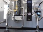 Neutronics Gas Analyzer