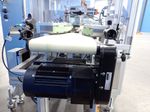 Optel Assembly Machine